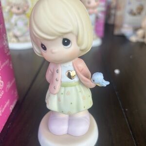 Precious Moments Pink and White Figurine